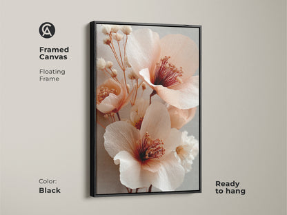 Framed canvas with black floating frame showcasing blush pink peony artwork. Ready to hang art for botanical home decor. The coral flower blossoms and soft gray accents create a boho feel. Elegant flower art for a bedroom or living room. A perfect gift.