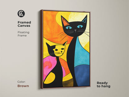 A framed canvas print of a cat artwork with a brown floating frame. This colorful feline artwork features a black cat and a yellow cat. The framed canvas print is ready to hang and will be a great addition.