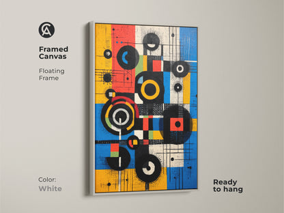 Framed canvas art in a white floating frame. The Mid-Century Modern abstract artwork showcases geometric circles and squares in yellow blue and red. This ready-to-hang piece offers a clean contemporary aesthetic to any space.