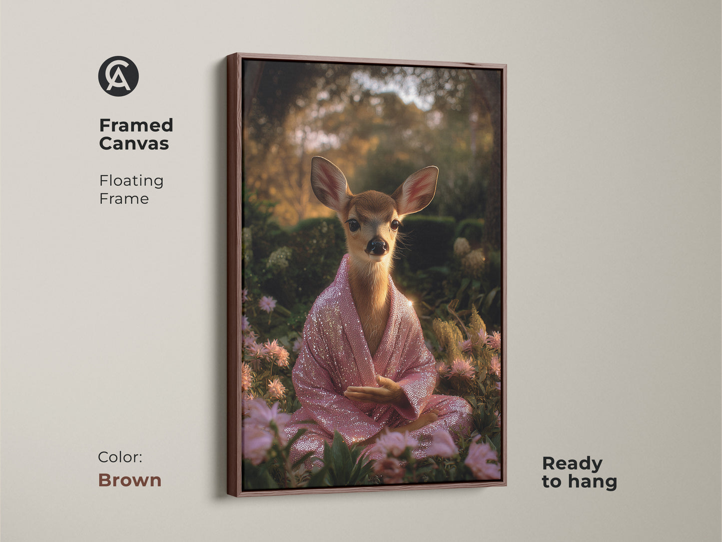 Framed canvas art with a floating brown frame featuring a meditating deer. The spiritual animal is ready to hang. The pink sequin robe art is a unique zen animal artwork. A yoga meditation gift art.