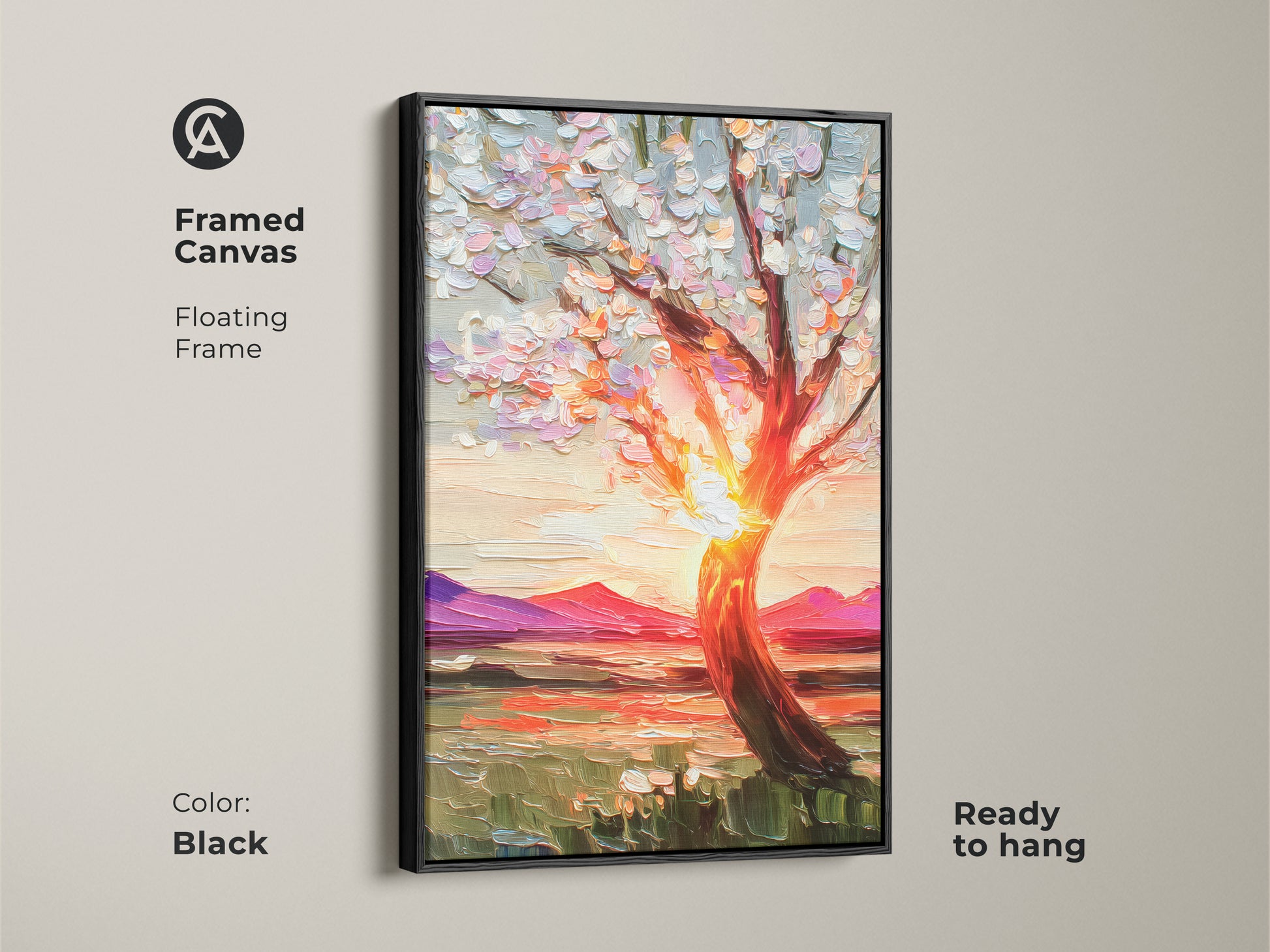 A framed textured canvas presents impressionist blooming tree artwork against a sunset. The black floating frame enhances the vibrant nature decor making it ready to hang. The orange yellow and pink landscape art adds a boho touch to a living room or home office a thoughtful gift.