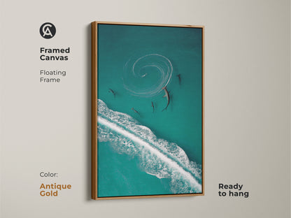 Elevate your decor with this framed turquoise ocean canvas art. Featuring an aerial shark and wave wildlife print this piece brings the coast to your walls. The antique gold frame adds a touch of elegance. An ideal addition for ocean lovers seeking unique artwork.