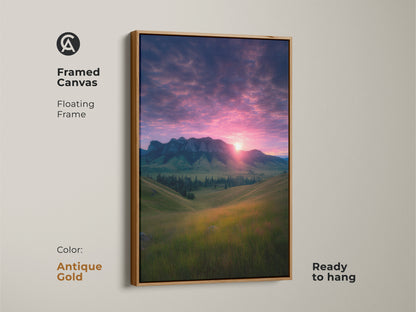 Framed canvas displays a mountain sunset with a floating antique gold frame. This nature landscape decor is ready to hang. This photorealistic art features rolling hills and a dramatic pink gold sky. This piece suits modern farmhouse aesthetic. It is a perfect gift for hikers and outdoor enthusiasts.