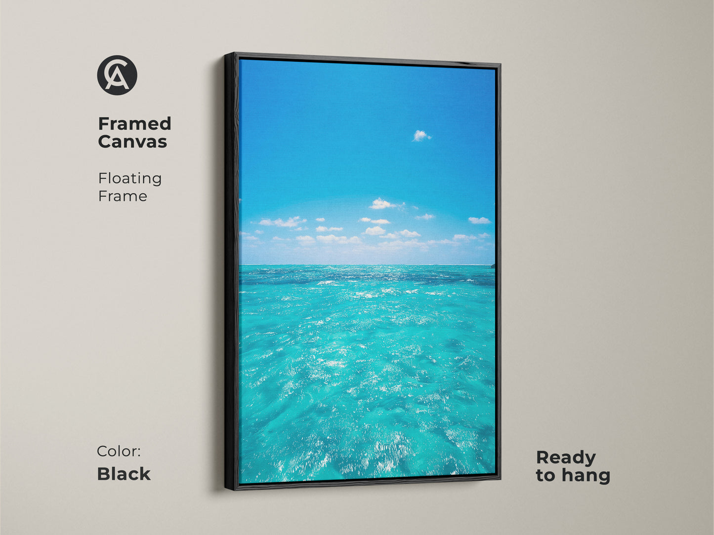 Framed canvas of a turquoise ocean view with a floating frame in black. This coastal beach wall art is ready to hang. The blue sky water artwork is perfect for residential blue art prints. Add a calm ocean wall hanging to your living room.