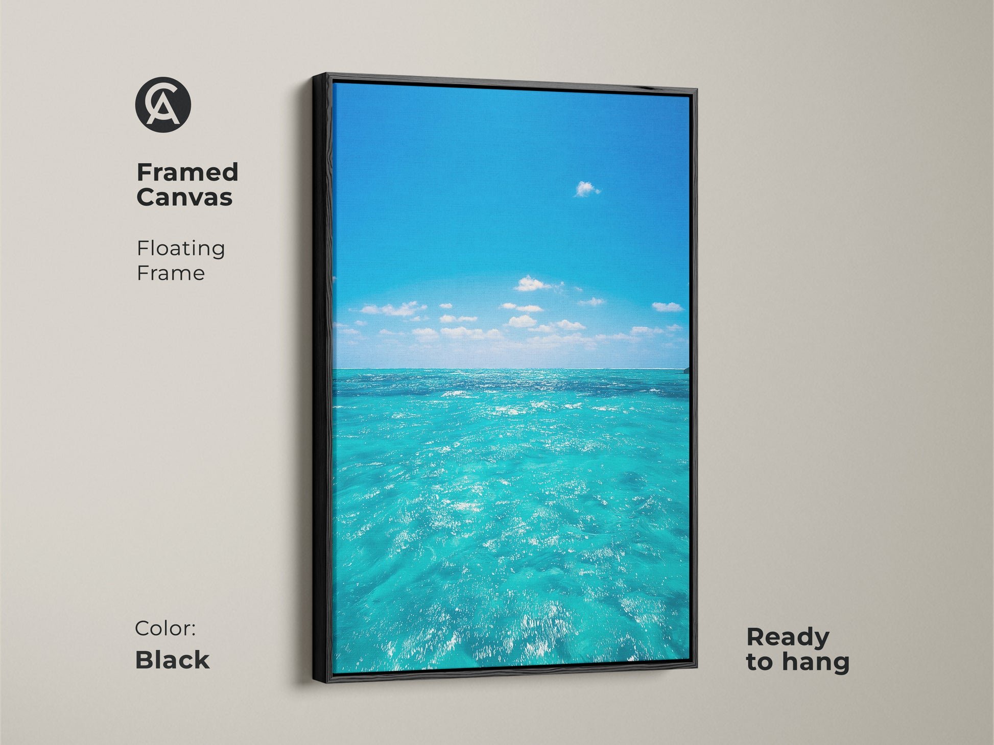 Framed canvas of a turquoise ocean view with a floating frame in black. This coastal beach wall art is ready to hang. The blue sky water artwork is perfect for residential blue art prints. Add a calm ocean wall hanging to your living room.
