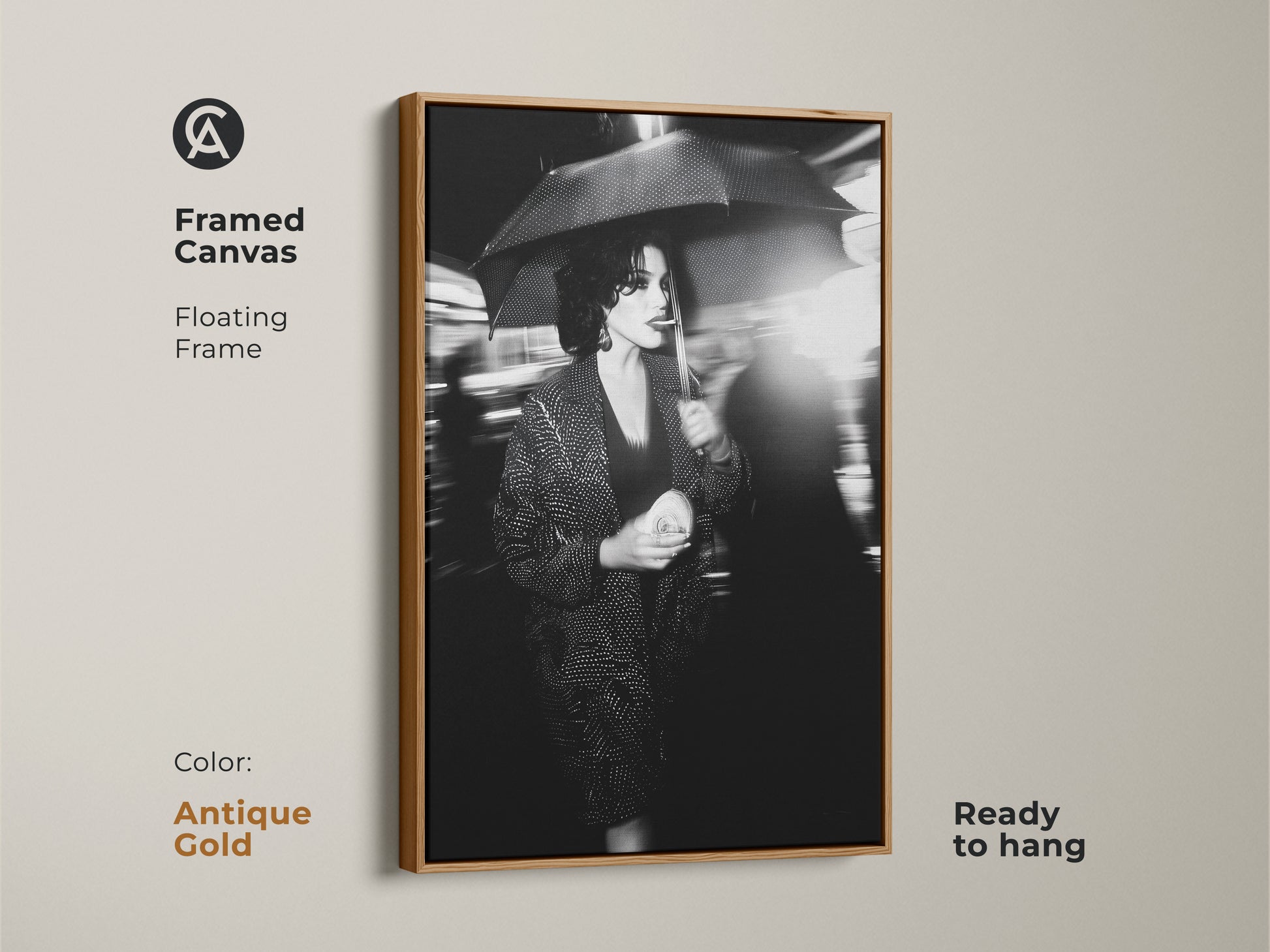The antique gold floating frame enhances the elegance of this canvas. This framed canvas art arrives ready to hang. This striking street photography print features a monochrome woman with umbrella. A perfect fusion of fashion and art for chic spaces. Enhance your contemporary home.
