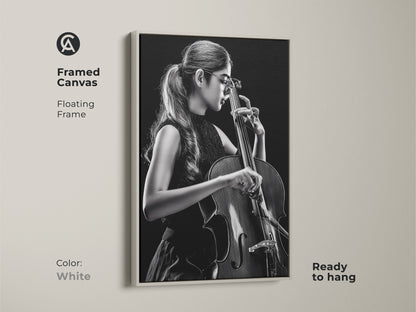 Framed canvas features a cellist. The artwork presents a floating frame in white. Ready to hang this contemporary piece offers a clean modern look. This musician wall art is perfect for minimalist spaces and music lovers.