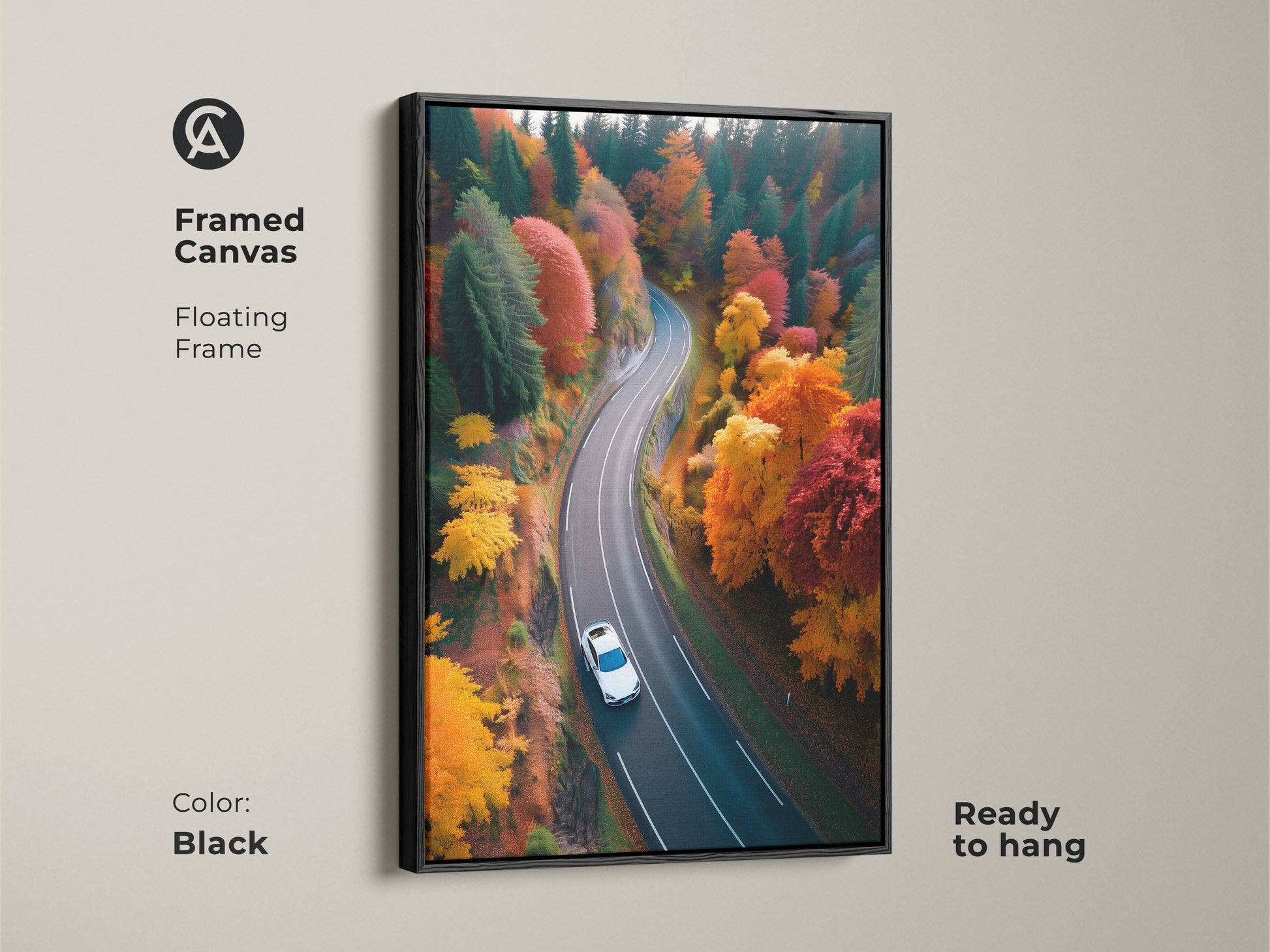 Enhance your living space with framed canvas art of a scenic autumn road. The black floating frame adds a contemporary touch. A car journeys through a forest of fall colors in this nature photograph. Its ready to hang and enjoy.