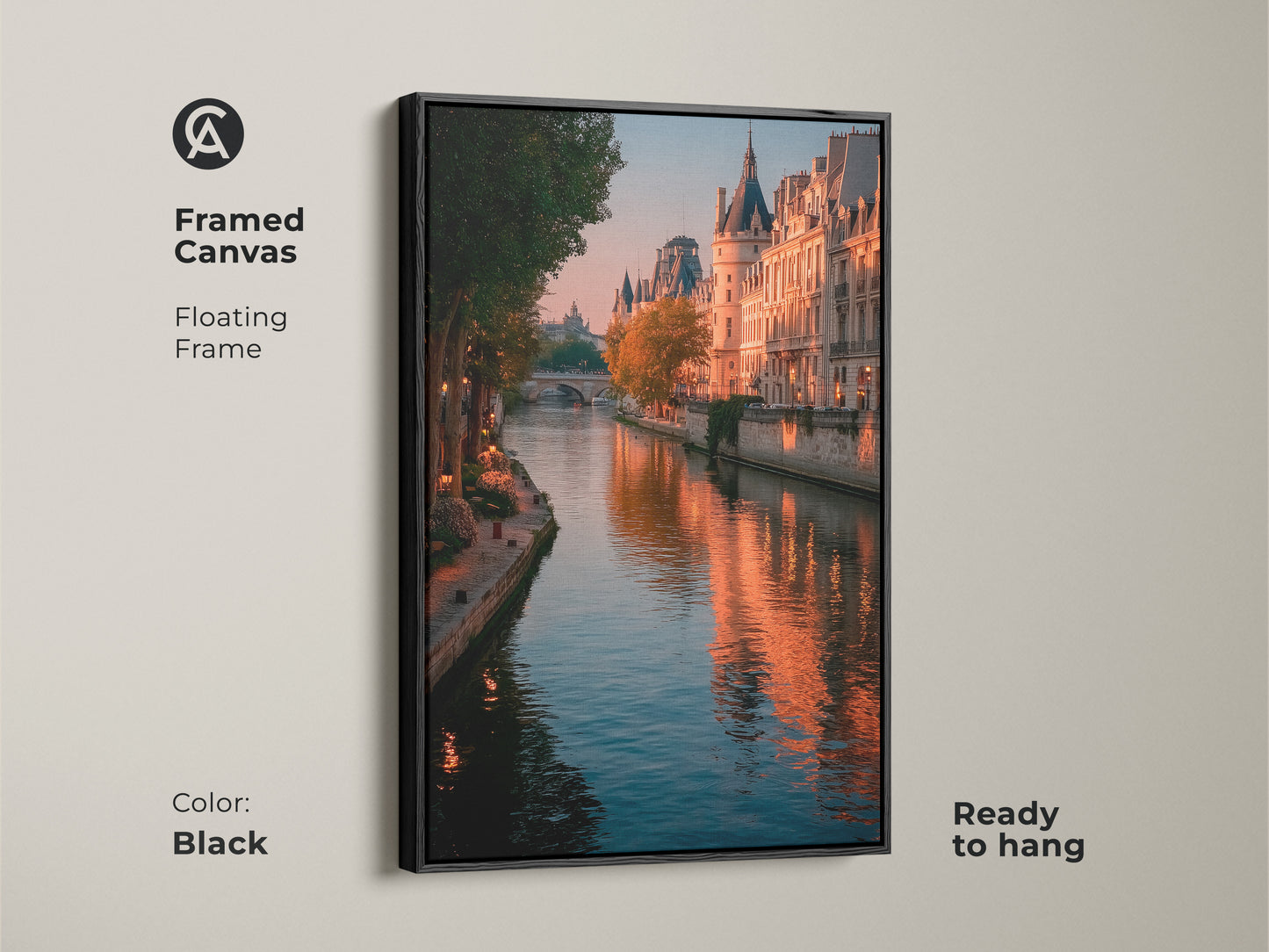 Framed canvas art featuring a Parisian cityscape. The black floating frame enhances the Seine River photography. Golden hour adds warmth to the Parisian buildings. This ready-to-hang piece offers contemporary home decor. Bring the romance of France into your space. This is a stylish piece for living rooms.