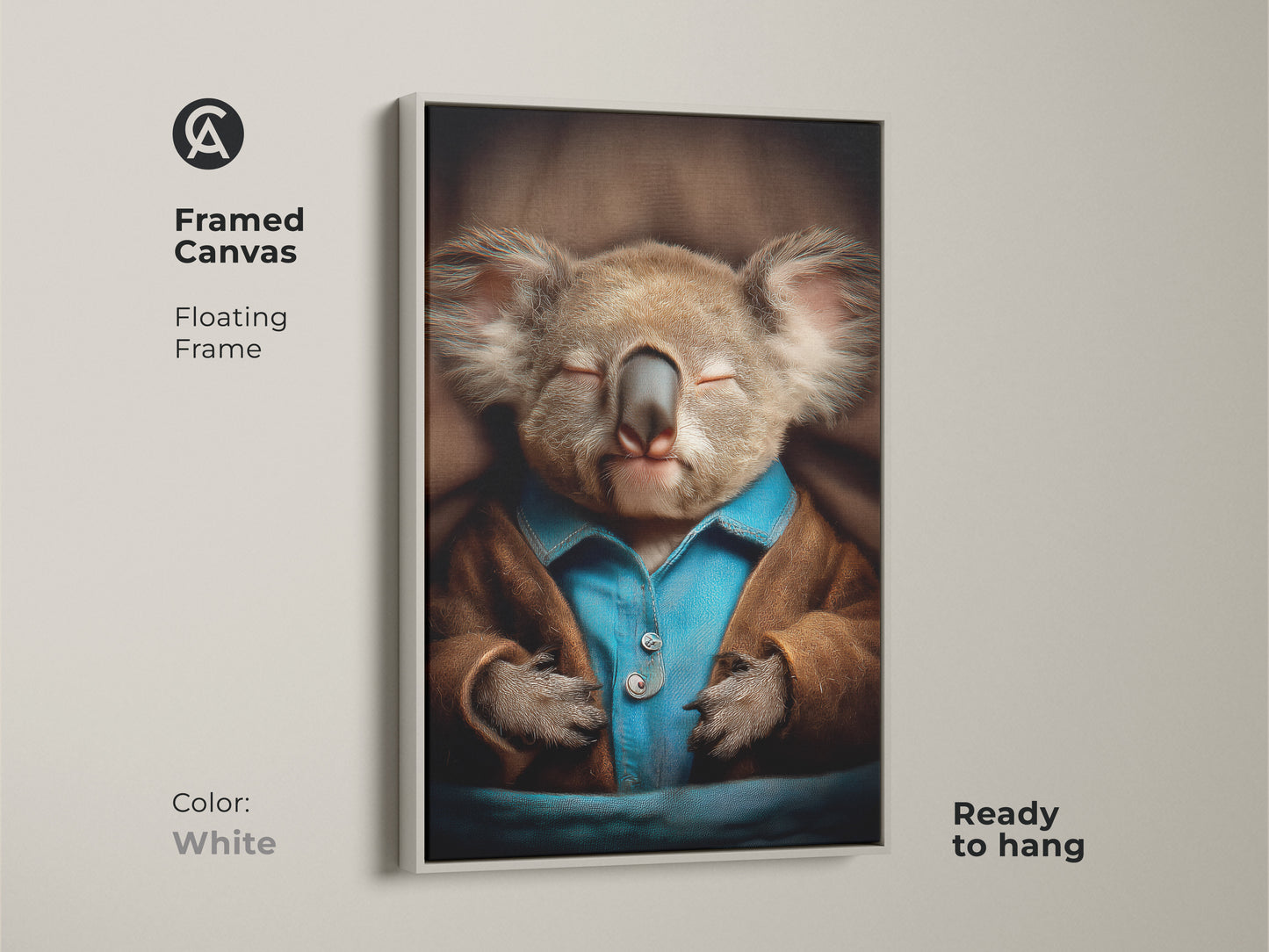 White framed canvas of a sleeping koala. This floating frame art is ready to hang. It shows a realistic animal print in cozy pajamas. The soft brown and blue colors make it perfect for nursery wall decor. A heartwarming gift for new parents. Add a touch of sweetness to your home.