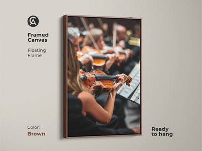 This canvas art print with a brown floating frame depicts a vibrant orchestra performance. The violinist stands out in this detailed artwork. Ready to hang this piece brings warmth and musical inspiration to any room. Perfect for music lovers and musicians alike.
