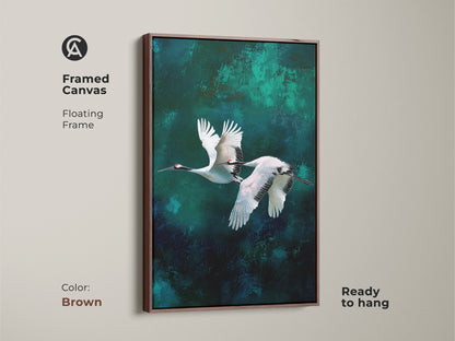 Framed abstract crane wall art in brown floating frame. This elegant teal emerald canvas print is nature inspired. Ink wash bird art shows minimalist flying cranes. It is ready to hang for instant decor.