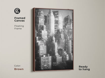 This framed canvas features a floating frame in brown. The black and white skyline artwork is ready to hang. Enhance your decor with this sophisticated NYC cityscape art.