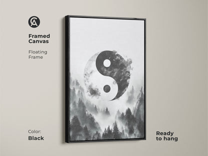 Framed canvas of the black Yin Yang in a misty forest. The floating frame enhances the monochrome nature artwork. Zen spiritual home decor is ready to hang in your home.