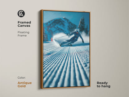 Framed canvas art capturing a skier in motion. The antique gold floating frame adds a vintage touch to this dynamic artwork. Ready-to-hang this piece brings a unique flair to your home decor. The gold frame complements the cool tones.