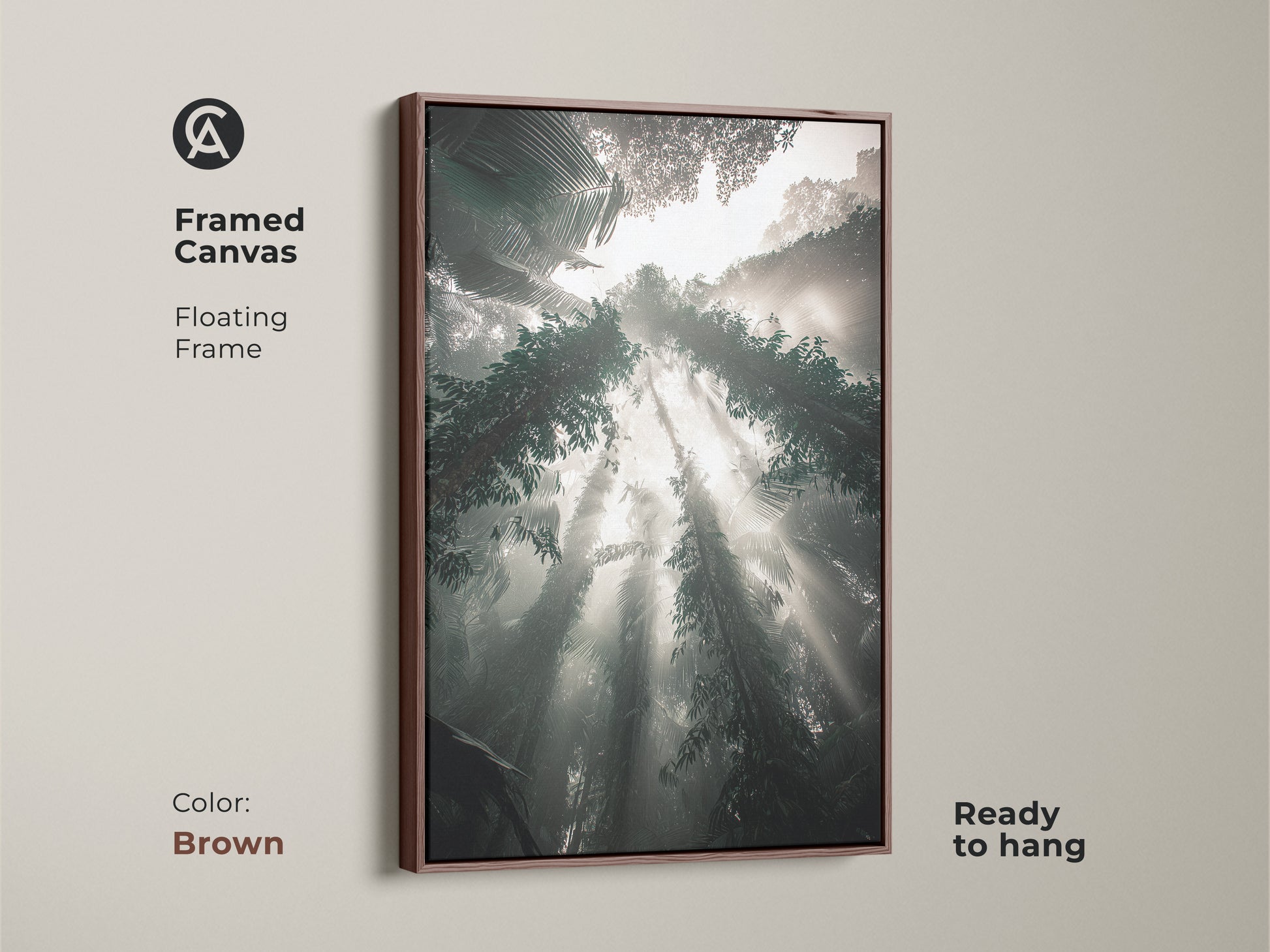 A framed canvas with a brown floating frame displays a misty forest scene with sunbeams. This teal gray green nature landscape artwork offers a biophilic accent. Ready to hang this print adds an earthy tone to any room. Perfect for nature lovers.