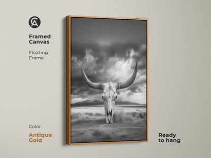 Framed canvas displaying a longhorn skull in a desert setting. This antique gold framed art adds a rustic western touch. The monochrome animal skull artwork is ready to hang. Perfect as a cowboy gift for him. This minimalist western art enhances your home.