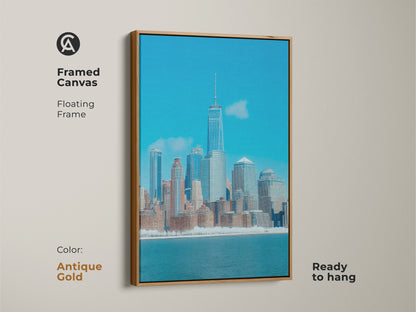 Framed canvas showcasing a modern blue NYC cityscape. The contemporary architecture artwork features an antique gold floating frame. This urban skyline art is ready to hang adding sophistication.