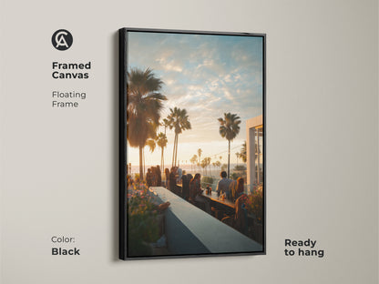 Framed canvas art with a black floating frame. The artwork presents a sunset view from a rooftop bar. Palm trees and people add to the ambiance. Ready to hang. This piece will enhance any living space with its beauty.