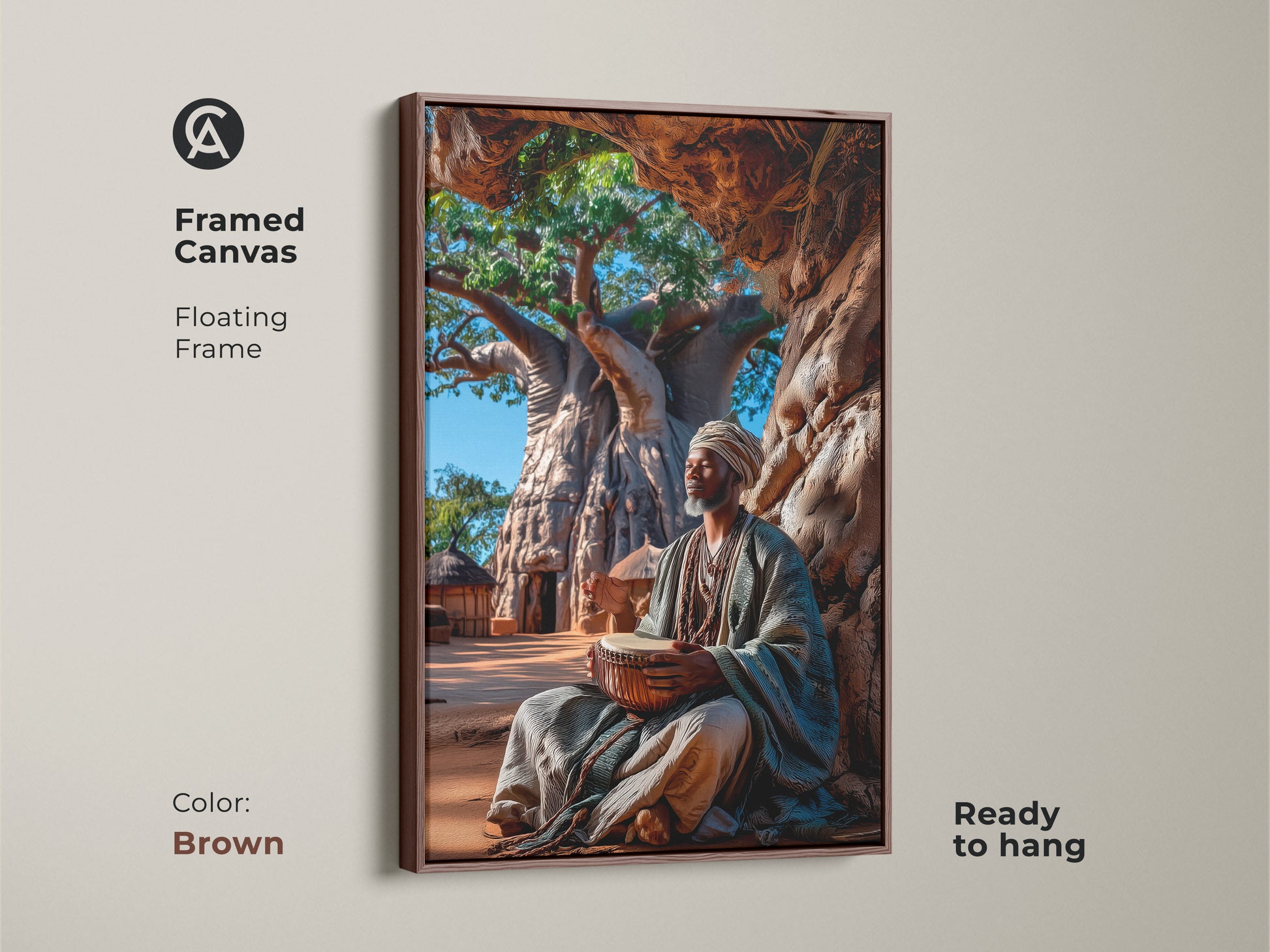 Framed canvas in a brown floating frame showing an African man playing a djembe under a baobab tree. This earth tone canvas art is ready to hang. The cultural heritage decor adds a worldly feel to your space. Perfect as a housewarming gift idea.