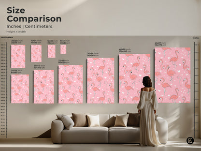 Size comparison inches centimeters of the pink flamingo artwork. The art is displayed above a sofa. See the different sizes of canvas prints from small to large. The artwork is a great way to add a touch of charm to your walls and complements various decor styles.