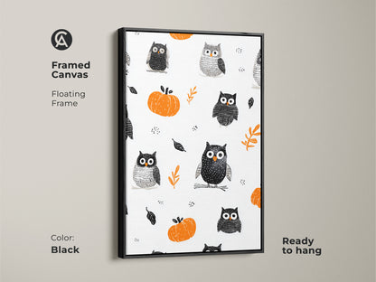 Framed Canvas in a floating frame featuring a Halloween owl and pumpkin artwork. The black frame enhances the whimsical nursery art. Perfect seasonal kids decor this cute animal wall art adds folk art to any room. Ready to hang offering instant charm.