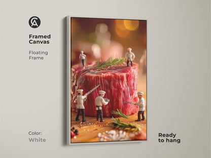 White framed canvas featuring miniature chefs preparing a raw steak. The floating frame offers a clean modern look. Ready-to-hang food art perfect for contemporary kitchens. Elevate your space with culinary art.
