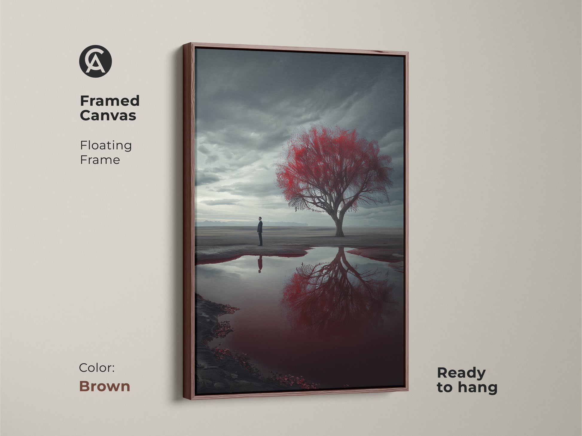 Framed canvas print displays a surreal desert landscape with a red tree and man. The floating frame in brown complements the contemporary artwork. This piece is ready to hang and adds a unique focal point to any room. A great housewarming gift for collectors of surrealism.