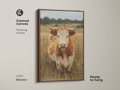 This framed canvas shows a cow portrait with a floating frame in brown. The artwork features a cow standing in a field. Ready to hang the canvas adds warmth to animal art. The natural tones complement the subject.