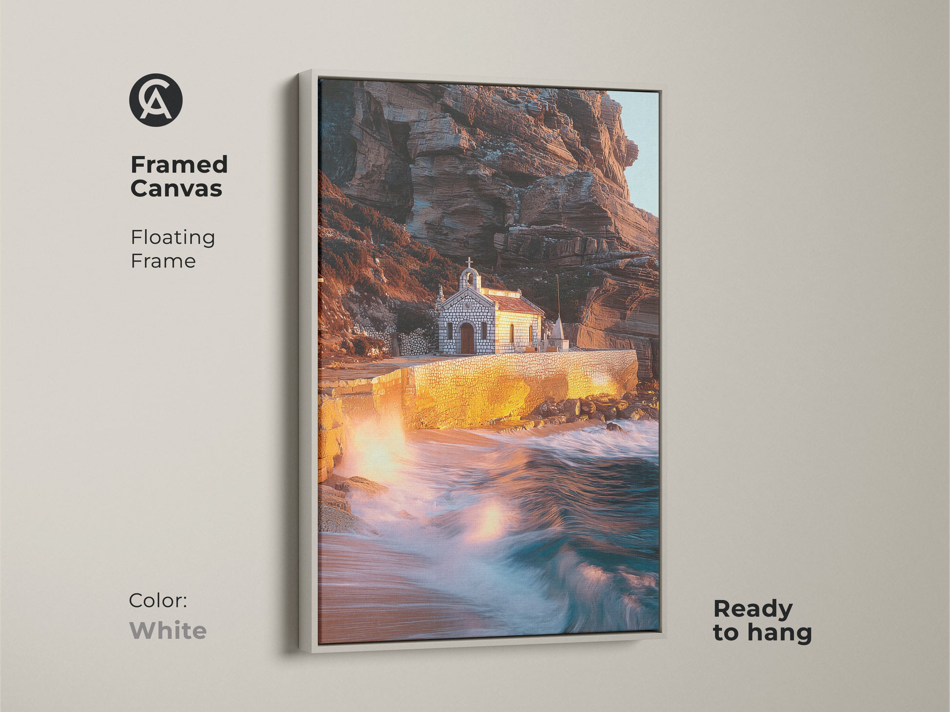 White framed canvas art shows a coastal chapel. The floating frame complements the warm earth tones and teal accents. Ready-to-hang ocean waves photograph captures the essence of Mediterranean coastal art. An excellent housewarming gift for coastal home decor.
