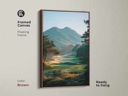 Framed canvas artwork of a scenic golf course. The floating frame is brown and the art is ready to hang. This artwork captures the beauty of the green with mountains in the distance. Ideal for golf lovers seeking a serene landscape.
