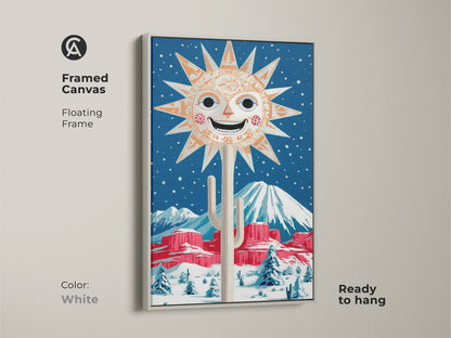 Framed canvas art featuring a retro desert winter scene with a white floating frame. The artwork includes a smiling sun and cactus in a snowy landscape. This folk art print is perfect for an eclectic entryway. The orange and blue wall decor adds a touch of retro charm to any room.