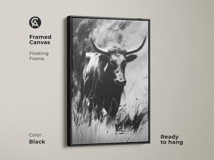 Framed canvas art featuring a monochrome bull. A floating frame enhances this charcoal sketch longhorn. This wildlife animal print is ready to hang. The black frame complements the rustic farmhouse canvas.
