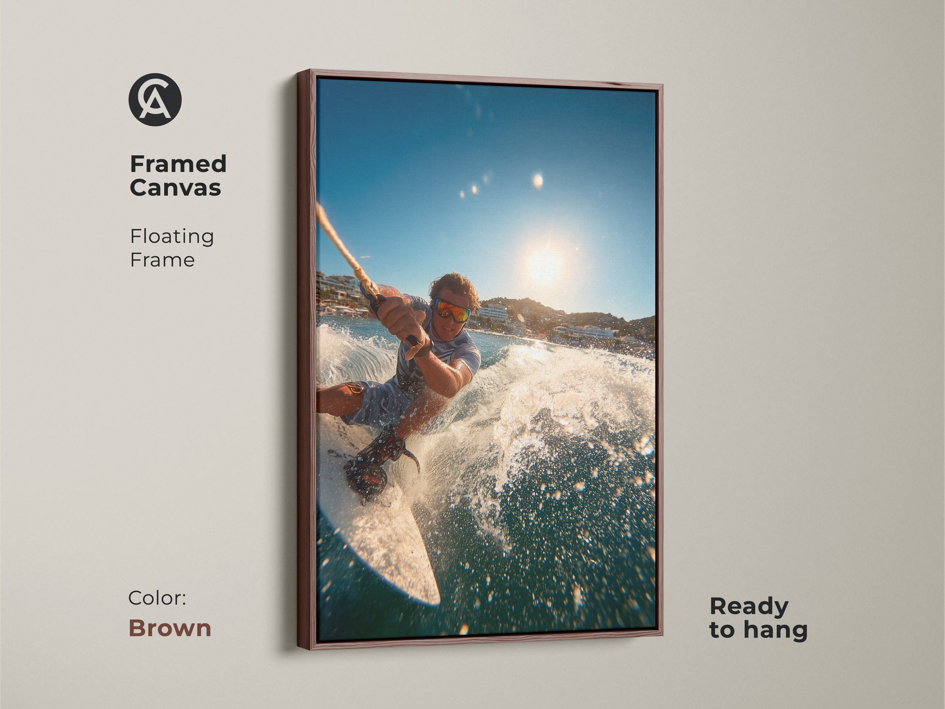 A framed canvas displays a man wakeboarding. It features a floating frame in brown. This artwork is ready to hang. The warm tones enhance the dynamic water scene. It adds a touch of adventure to your decor.