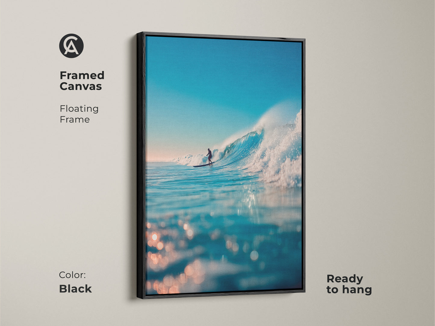 This framed canvas features a surfer riding a wave. The floating frame is black and the artwork is ready to hang. This stunning piece brings the beauty of the ocean into your home. Buy this framed art today.