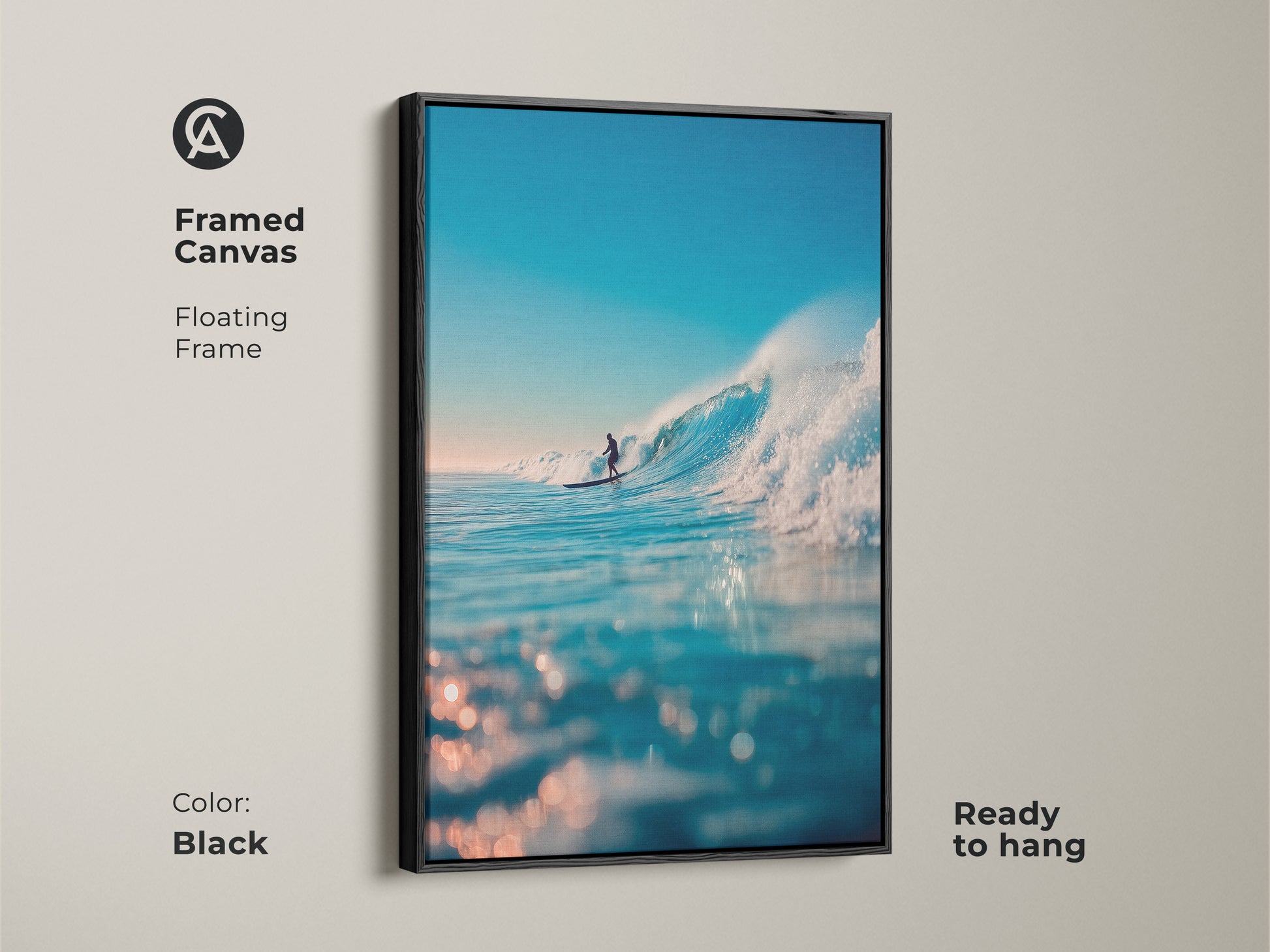 This framed canvas features a surfer riding a wave. The floating frame is black and the artwork is ready to hang. This stunning piece brings the beauty of the ocean into your home. Buy this framed art today.