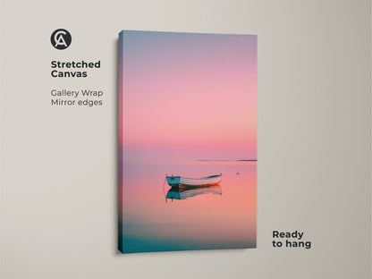 Stretched canvas art of a boat at sunset. This gallery-wrapped canvas features mirror edges. The artwork is ready to hang. The pastel colors create a serene mood. Find stretched canvas prints for your home.
