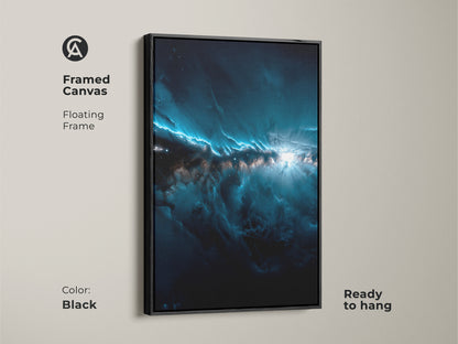 This is a framed canvas nebula artwork. The art features shades of dark blue and white. The frame is a sleek black color. This framed art is ready to hang. It features a floating frame. Purchase this framed artwork today