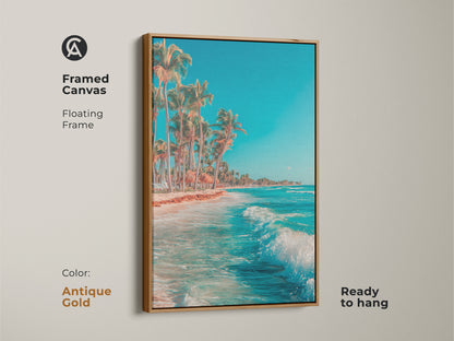 Framed canvas print with a floating frame in antique gold. Tropical beach art featuring ocean waves and palm trees. This ready to hang artwork brings a touch of luxury to your walls. The Canvas is Ready to hang.