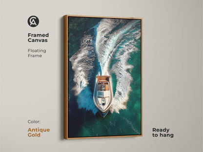 Framed canvas print of a speedboat speeding on deep teal ocean water. This contemporary artwork features a floating antique gold frame ready to hang. The aerial view captures the dynamic wake of the boat. Ideal for modern nautical home or office decor.