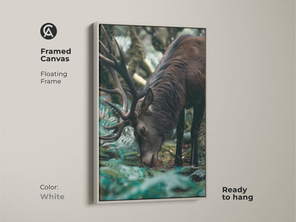 White framed canvas featuring a majestic elk. This rustic forest green artwork adds a touch of nature to your decor. The photorealistic deer print is ready to hang. Ideal for a bedroom or living room.