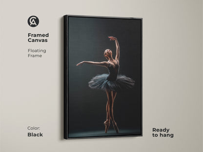 Black framed canvas of a ballerina. Floating frame adds a modern touch. Ready to hang. This artwork captures the grace of a dancer en pointe. Perfect wall art for ballet lovers. Enhance your decor with this elegant piece.