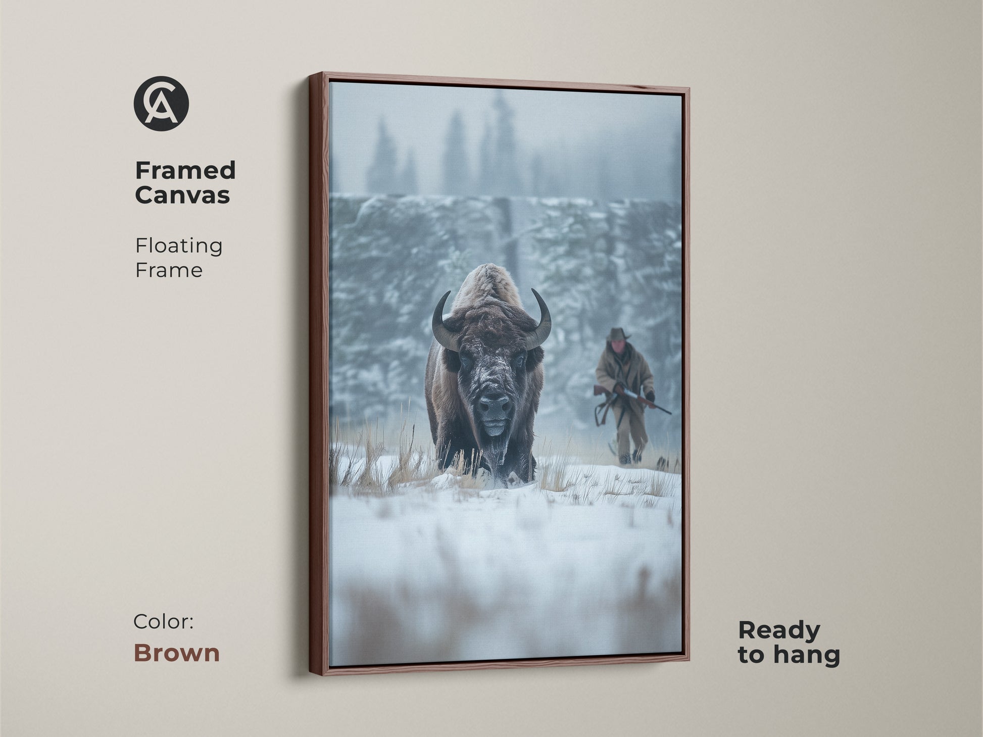 Framed canvas art of a bison in a winter landscape. The floating frame is brown. The artwork shows a bison and a hunter in snowy field. Ready to hang and enjoy. Perfect for adding rustic charm to any room.