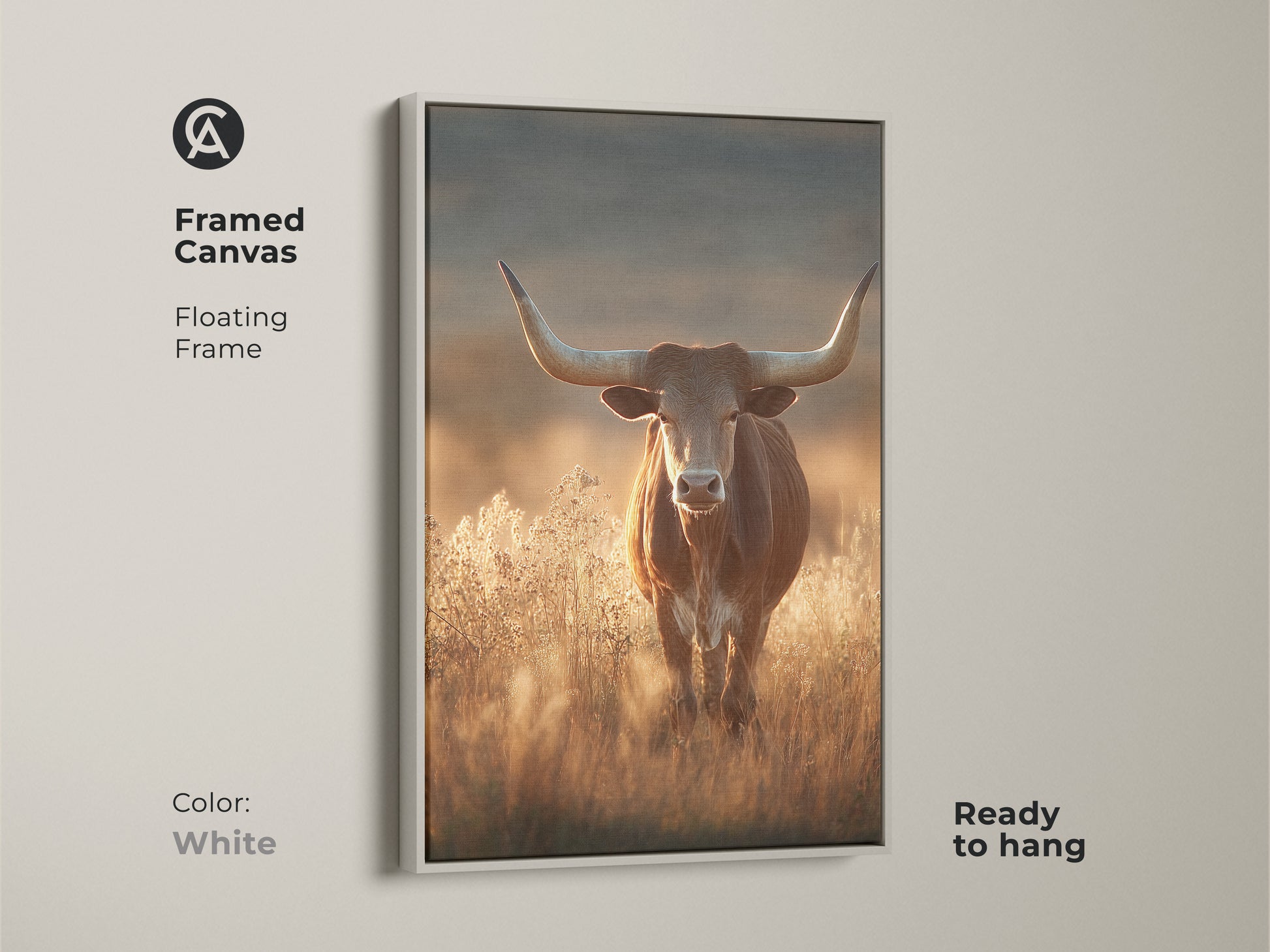 Framed canvas art of a longhorn bull in a savanna. This rustic western wildlife art features earthy tones and a white floating frame. The photorealistic bull canvas is ready to hang. It will add character to any room. This is perfect as rustic wall art.