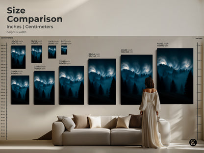 Size comparison of misty forest wall art in inches and centimeters. See the dark teal pine trees artwork in various sizes above a couch. Perfect modern home decor.