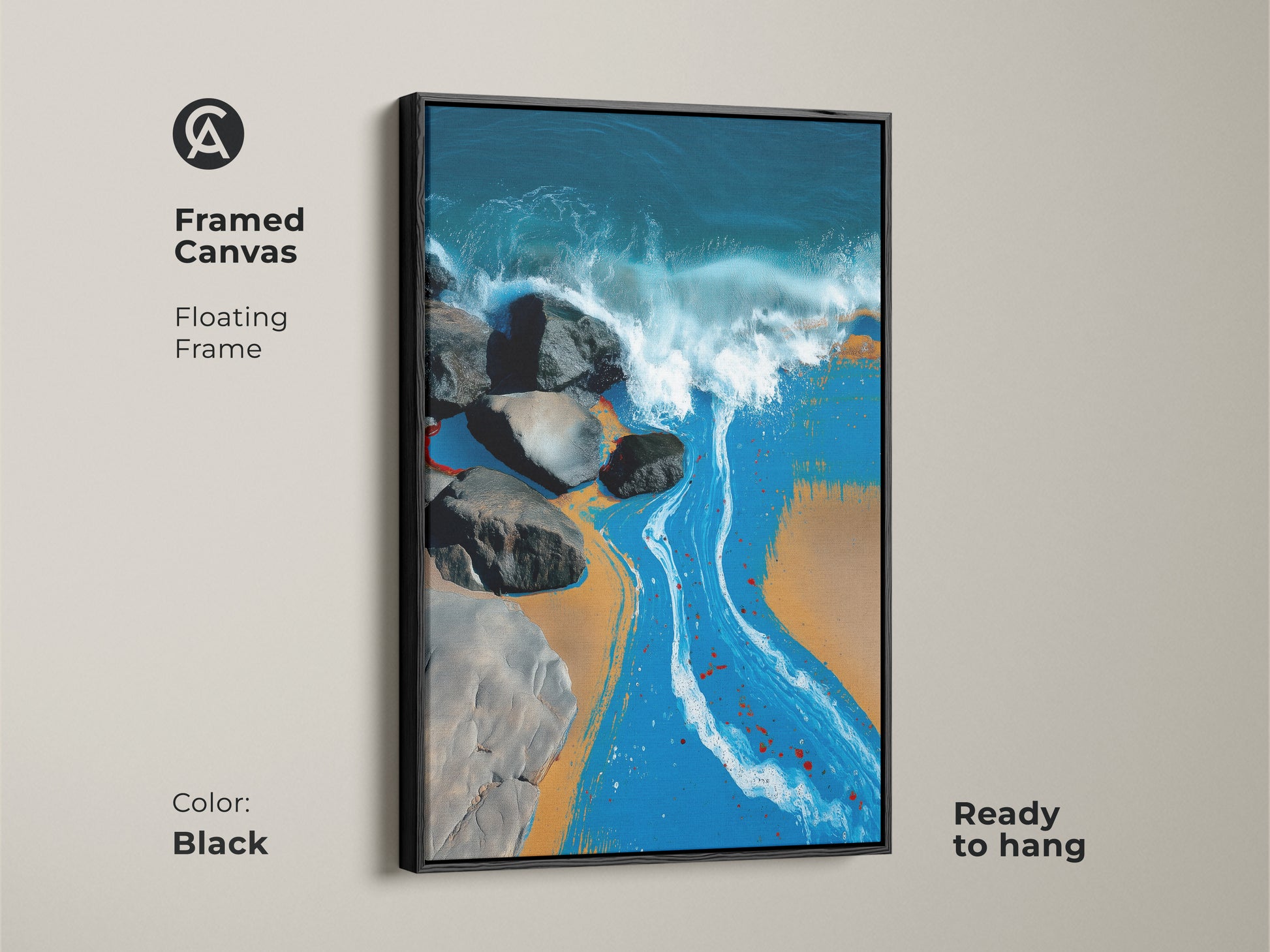 Framed canvas floating frame in black. This coastal artwork captures ocean waves crashing against rocks on a sandy beach. The abstract modern art is ready to hang in any space.