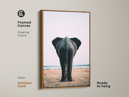 Antique gold framed canvas featuring an elephant butt print. This contemporary safari artwork is ready to hang. The floating frame enhances the photorealistic animal art. Displaying a minimalist savanna aesthetic. This wildlife art adds a unique touch to your home decor. Ideal for animal lovers and art collectors.