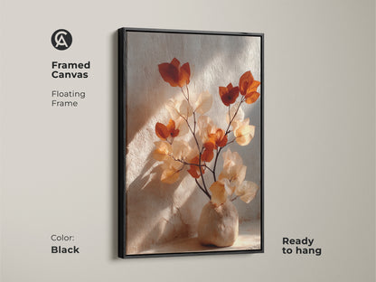Framed canvas in black featuring Terracotta Bougainvillea. Floating frame showcases cream and burnt orange botanical artwork. Ready to hang this boho vase still life wall art. Add organic modern elegance to your living room with this plant art.