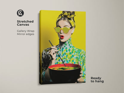 Stretched canvas of a pop art woman with noodles. The gallery wrap features mirror edges. The artwork is ready to hang. This colorful print showcases a woman in retro sunglasses. It's a vibrant addition to any eclectic art collection.