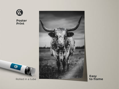 Museum-quality poster print showcasing a black and white Texas Longhorn. The monochrome cow print is rolled in a tube for easy framing. The artwork will add a touch of rustic ranch decor to your living space. It's a versatile piece that complements farmhouse or minimalist interiors bringing a touch of the wild west to any residential space.